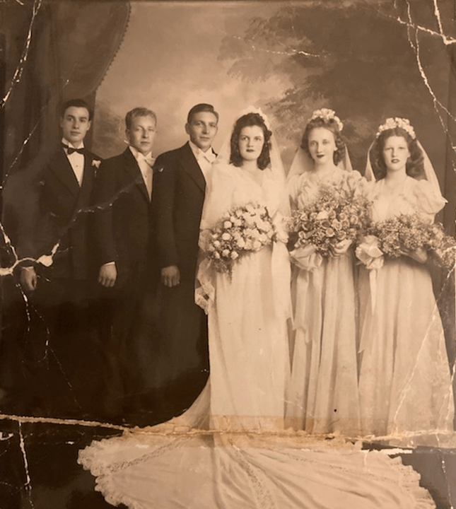 Man and woman with wedding party 1942